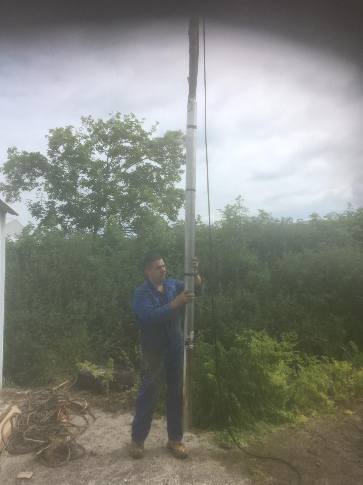 Ian at work fixing an irrigation system